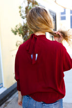 Load image into Gallery viewer, Bold Dreams Wine Smocked Three Quarter Sleeve Tie Back Top