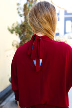 Load image into Gallery viewer, Bold Dreams Wine Smocked Three Quarter Sleeve Tie Back Top