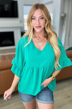 Load image into Gallery viewer, ANDREE BY UNIT- Airflow Peplum Ruffle Sleeve Top in Emerald