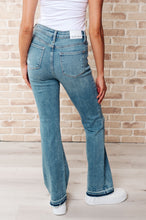 Load image into Gallery viewer, Isla Mid Rise Distressed Released Hem Bootcut Jeans- JUDY BLUE
