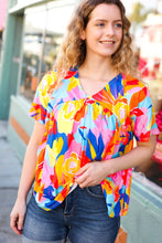 Load image into Gallery viewer, Orange &amp; Yellow Geometric Floral V Neck Dolman Top
