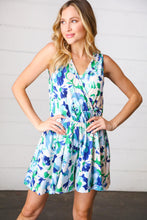 Load image into Gallery viewer, Lovely In Green &amp; Blue Floral Sleeveless Surplice Romper

