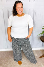 Load image into Gallery viewer, Let's Meet Up Black Animal Print Smocked Waist Palazzo Pants
