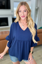 Load image into Gallery viewer, ANDREE BY UNIT- Airflow Peplum Ruffle Sleeve Top in Navy
