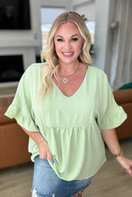 Load image into Gallery viewer, ANDREE BY UNIT- Airflow Peplum Ruffle Sleeve Top in Sage
